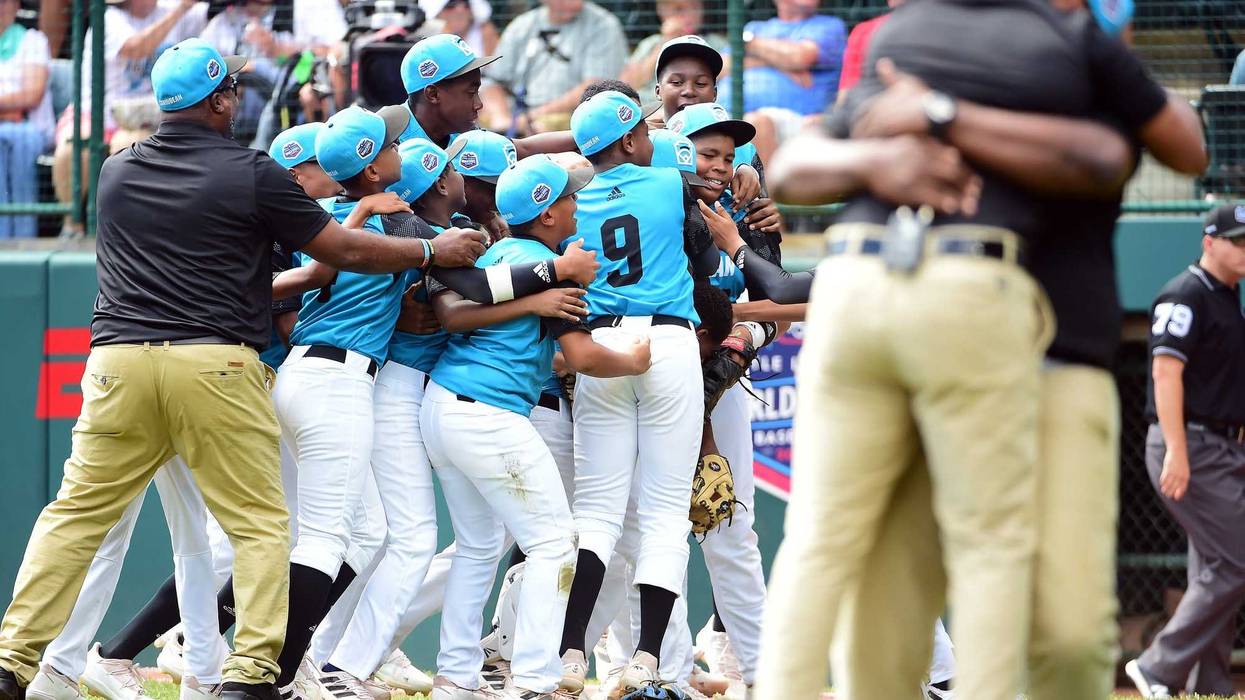 Caribbean Region players celebrate after beating the Asia Pacific Region 1-0.