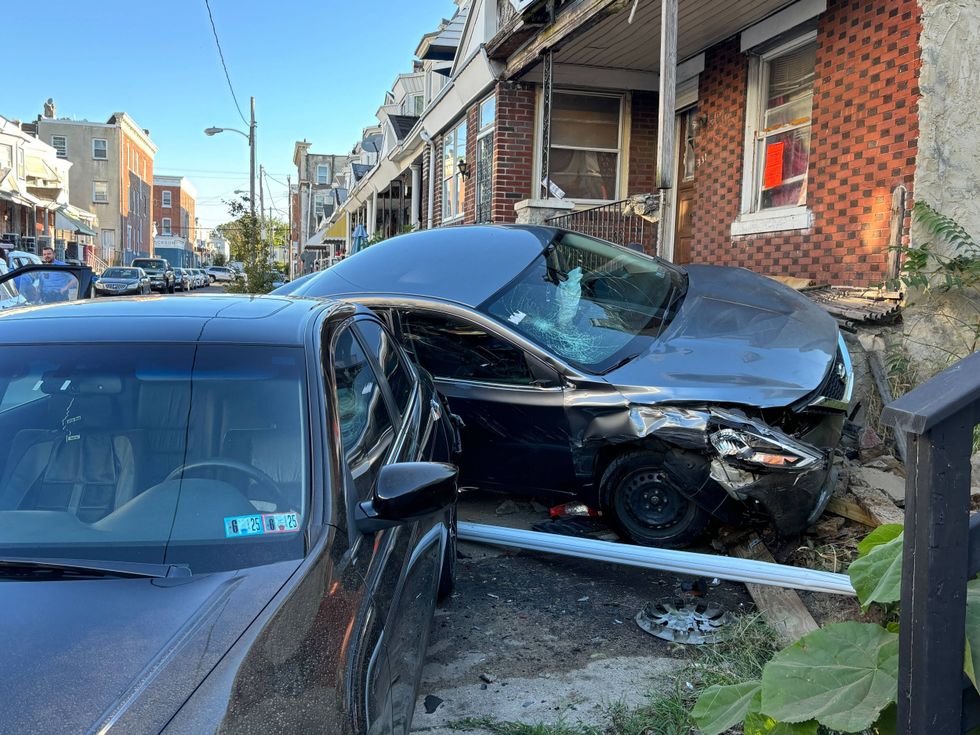 Carjacking suspect crashes car into West Philly row home during police pursuit