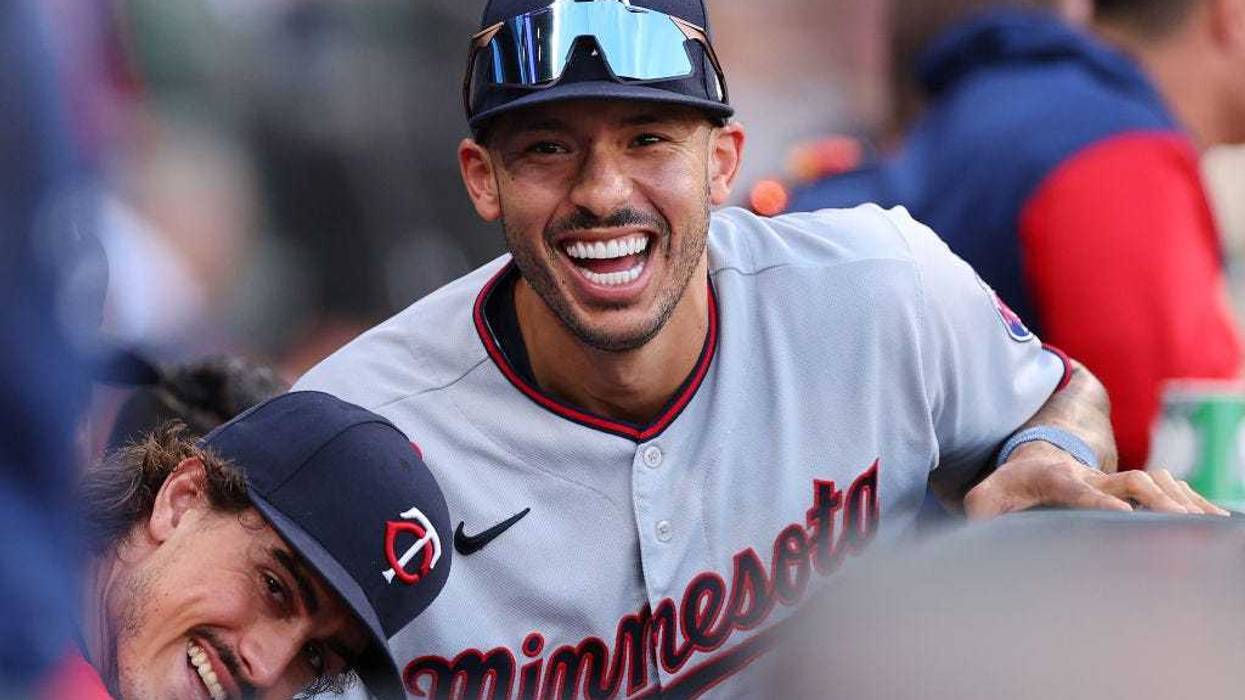 Carlos Correa #4 of the Minnesota Twins looks on against the Chicago White Sox at Guaranteed Rate Field on October 05, 2022 in Chicago, Illinois.