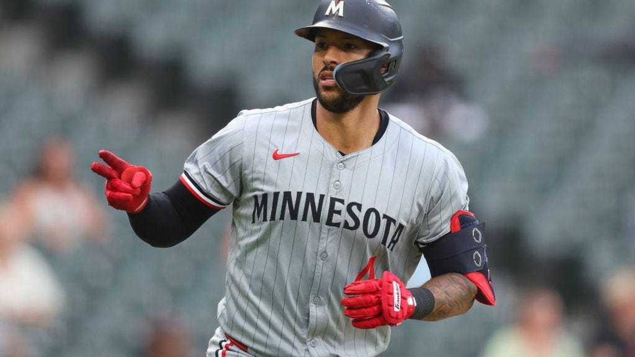 Carlos Correa #4 of the Minnesota Twins reacts after hitting a solo home run off Drew Thorpe #33 of the Chicago White Sox (not pictured) during the sixth inning at Guaranteed Rate Field on July 10, 2024 in Chicago, Illinois.