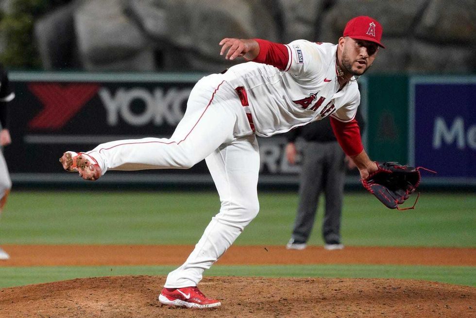 Carlos Estevez throws a pitch agains The Chicago White Sox at Angel Stadium.