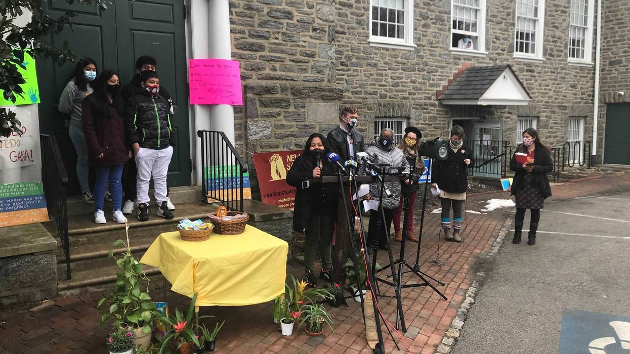 Carmela Apolonia Hernández speaks in front of the Germantown Menonite Church
