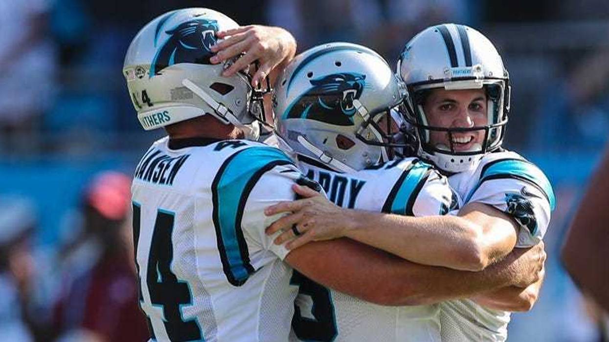 Carolina Panthers kicker Graham Gano (right) celebrates with teammates after kicking a 63-yard, game-winning field goal against New York Giants at Bank of America Stadium in Charlotte.