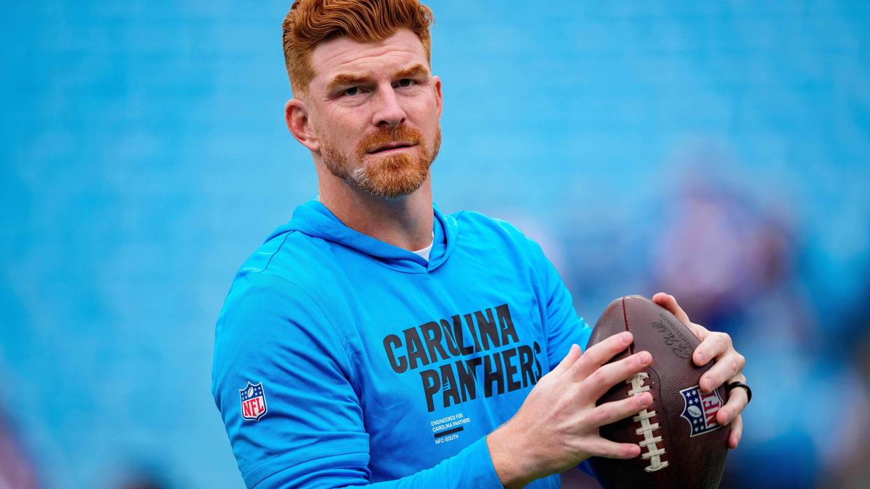 Carolina Panthers quarterback Andy Dalton (14) warms up before an NFL football game between the Carolina Panthers and the Dallas Cowboys on Sunday, Oct. 12, 2025, in Charlotte, N.C.