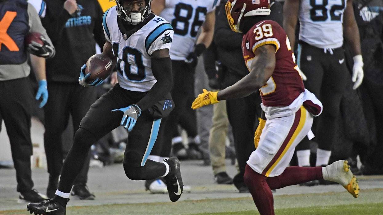 Carolina Panthers wide receiver Curtis Samuel (10) runs with the ball against the Washington Football Team during the first half at FedExField.