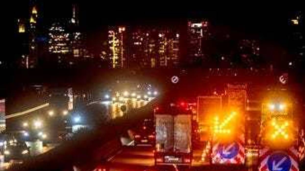 Cars and trucks drive on the main highway with the buildings of the banking district in background in Frankfurt, Germany, Monday, Sept. 14, 2020. (AP Photo/Michael Probst)