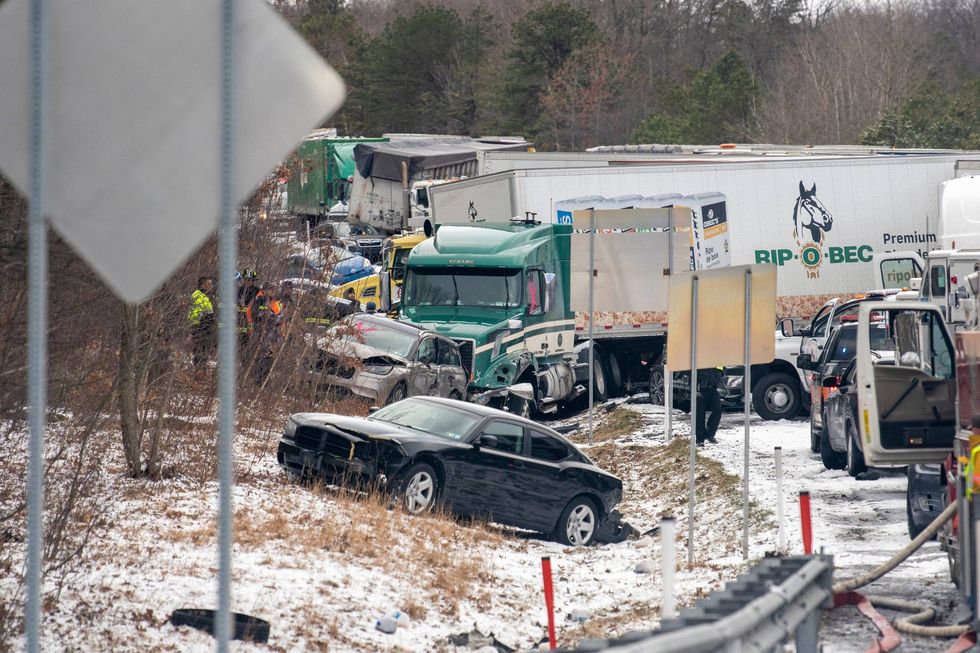 Cars are piled up on and off the road following a multi-vehicle crash on Interstate 81 North near the Minersville exit in Foster Township, Pa., March 28, 2022.