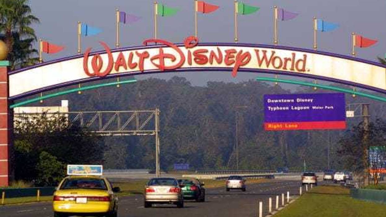 Cars drive into Walt Disney World November 11, 2001 in Orlando, Florida.
