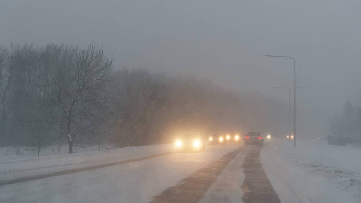 cars driving on snowy road