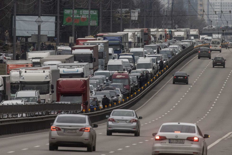 Cars sit at a standstill as people try to leave the city on February 24, 2022 in Kyiv, Ukraine
