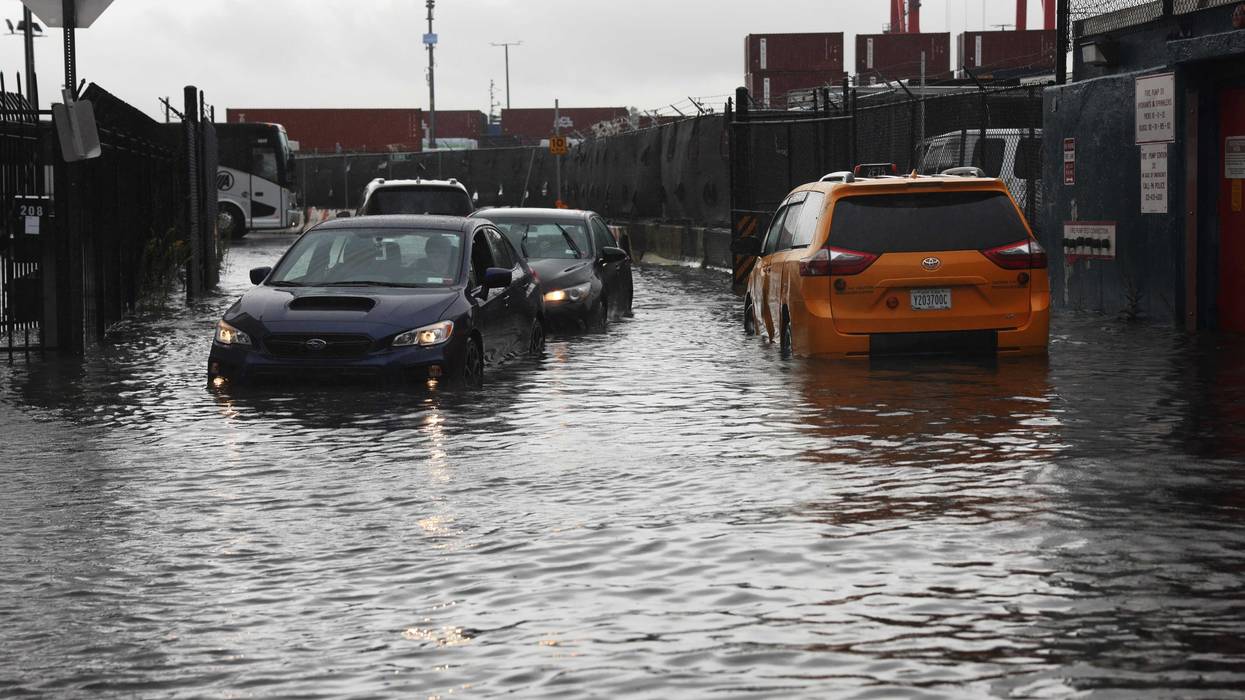 Cars sit stuck in the flooded streets in the Red Hook neighborhood on September 29, 2023 in the Brooklyn borough of New York City.