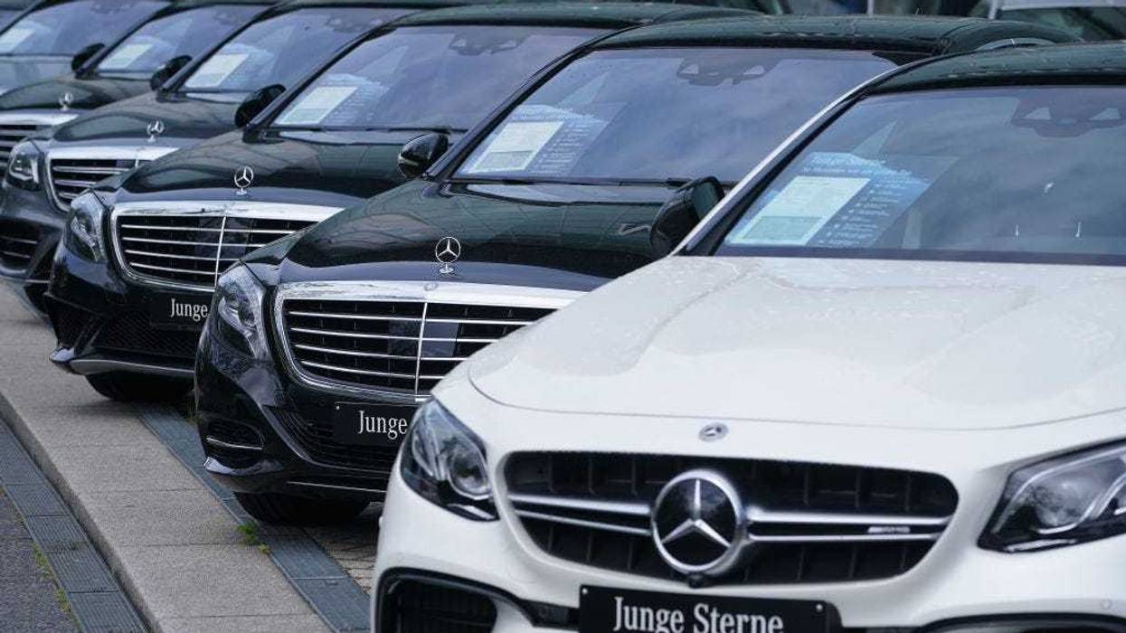 Cars stand on display for sale at a Mercedes-Benz dealership during the coronavirus crisis on May 05, 2020 in Berlin, Germany.
