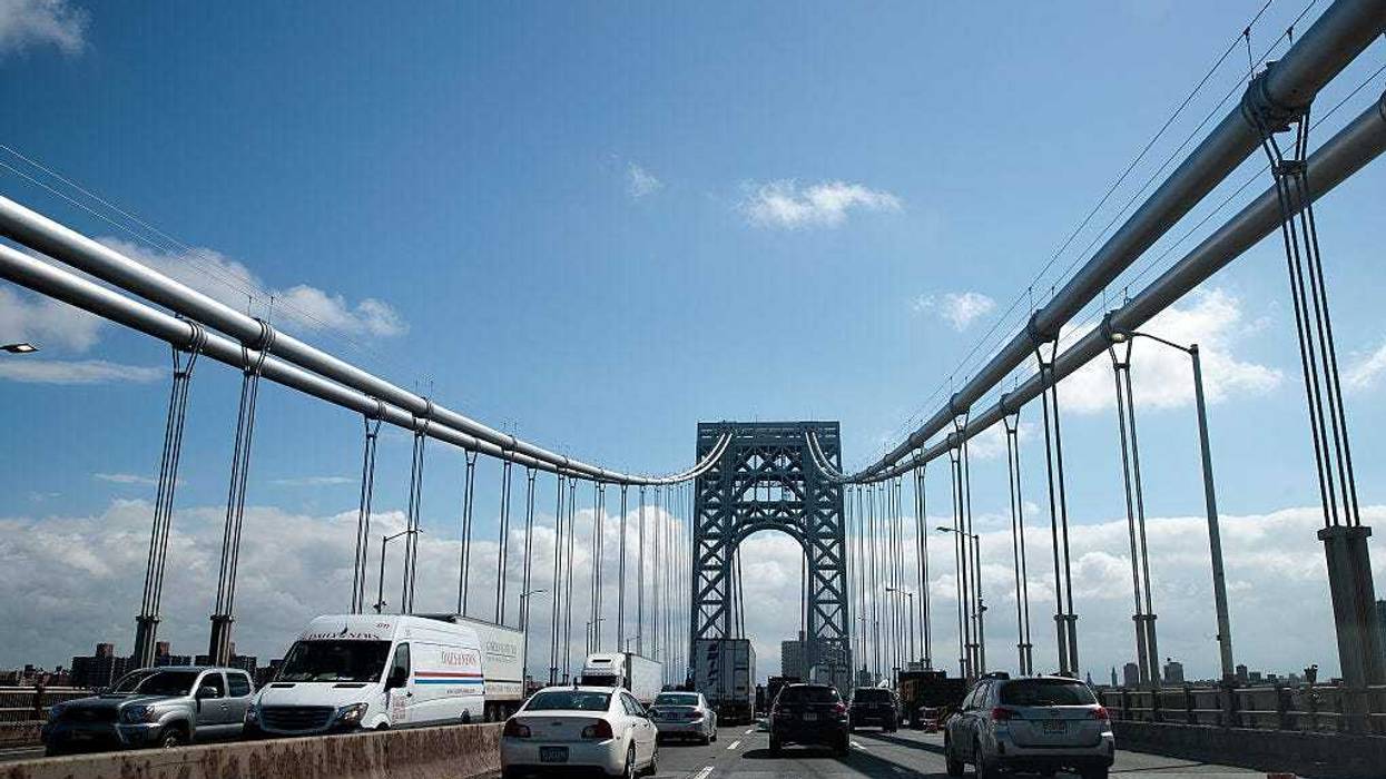 Cars travel across the George Washington Bridge, September 7, 2016 over the Hudson River between Fort Lee, New Jersey and New York City.
