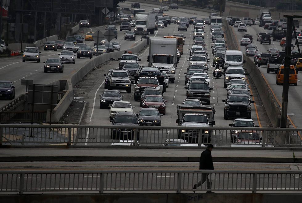 Cars travel along State Route 110.