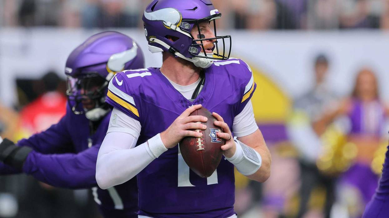 Carson Wentz #11 of the Minnesota Vikings looks to pass against the Cincinnati Bengals during the second quarter at U.S. Bank Stadium on September 21, 2025 in Minneapolis, Minnesota.