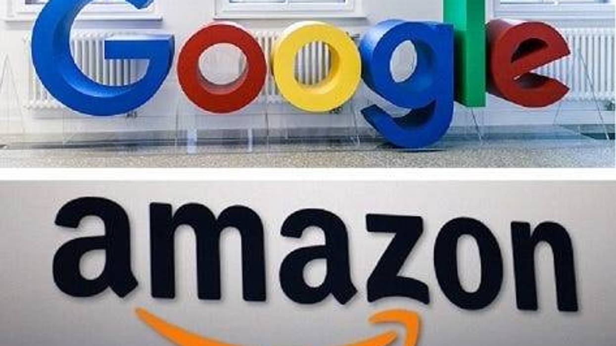 Carsten Koall / Stringer and David McNew / Stringer