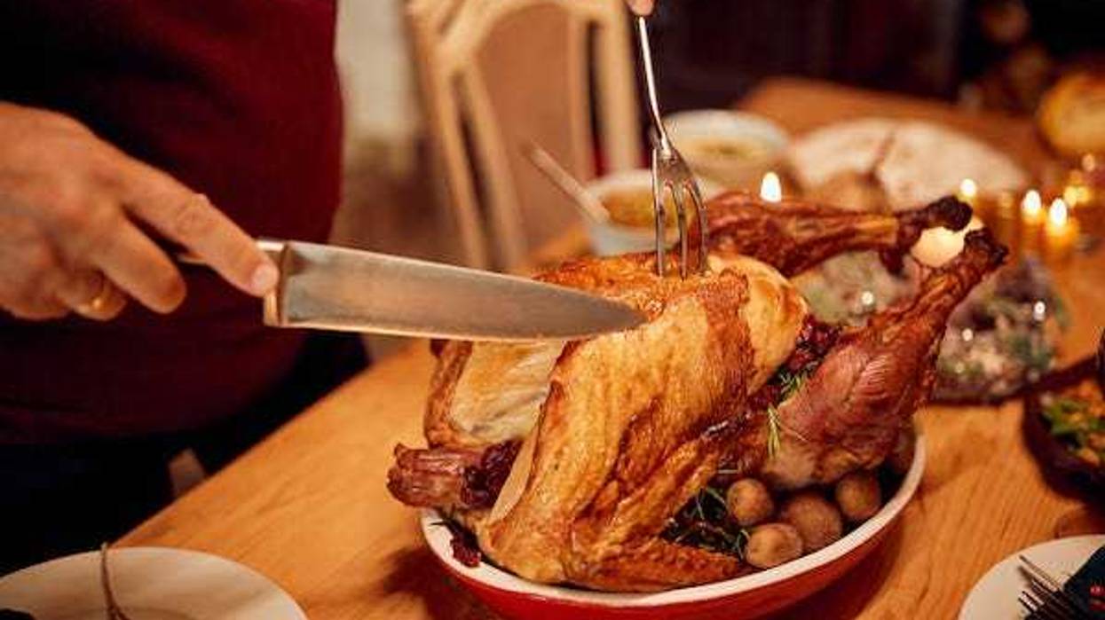 Carving turkey at Thanksgiving