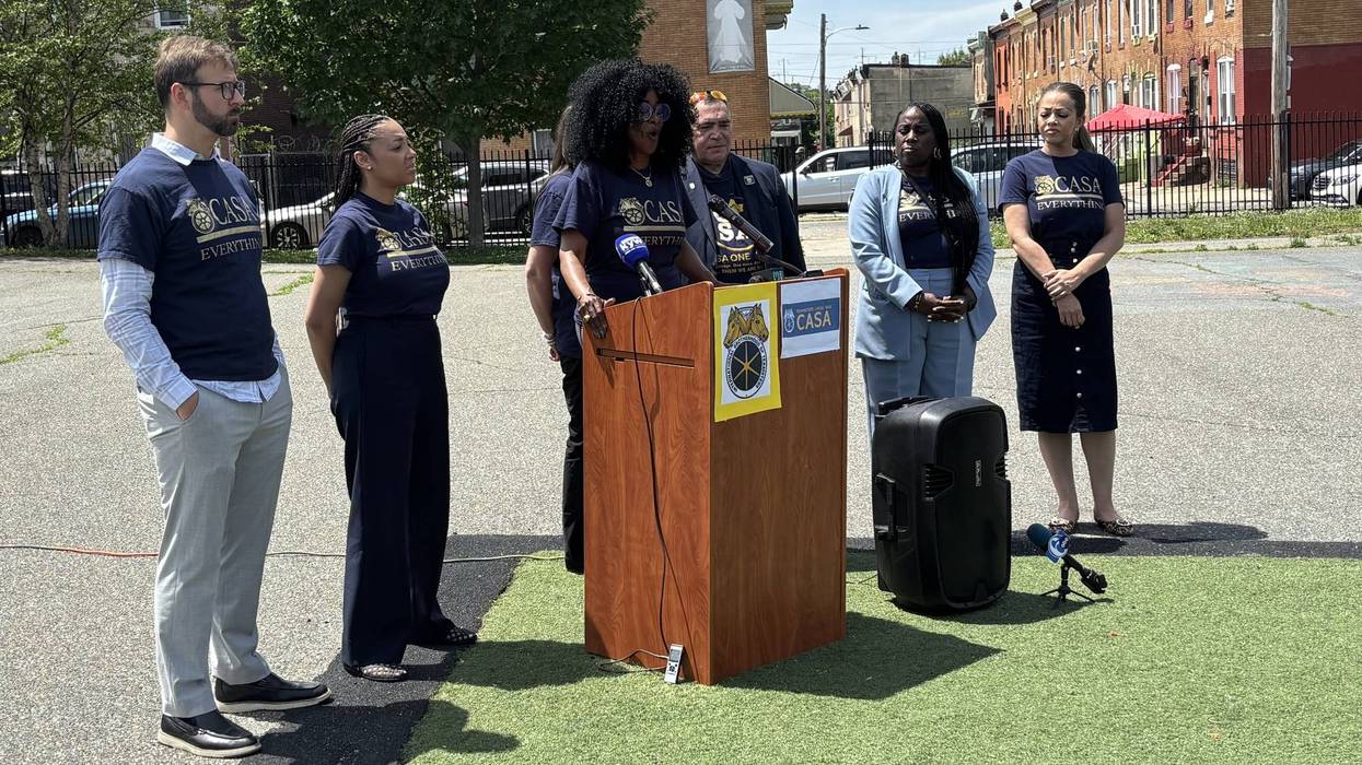 CASA Teamsters Local 502 President Robin Cooper (center, at podium) calls on City Council to approve Mayor Cherelle Parker's proposed rideshare tax to benefit Philadelphia schools.