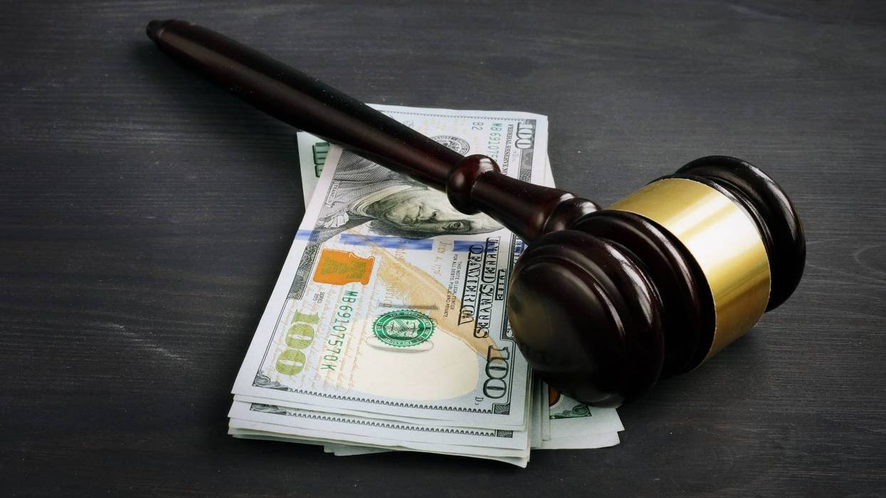Cash and judge's gavel