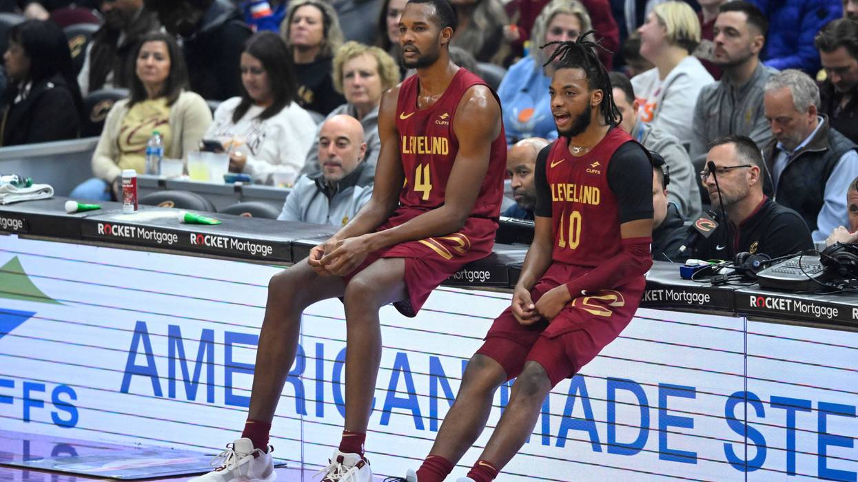 Cavaliers forward Evan Mobley (4) and guard Darius Garland (10) wait to enter the game in the first quarter against the Portland Trail Blazers