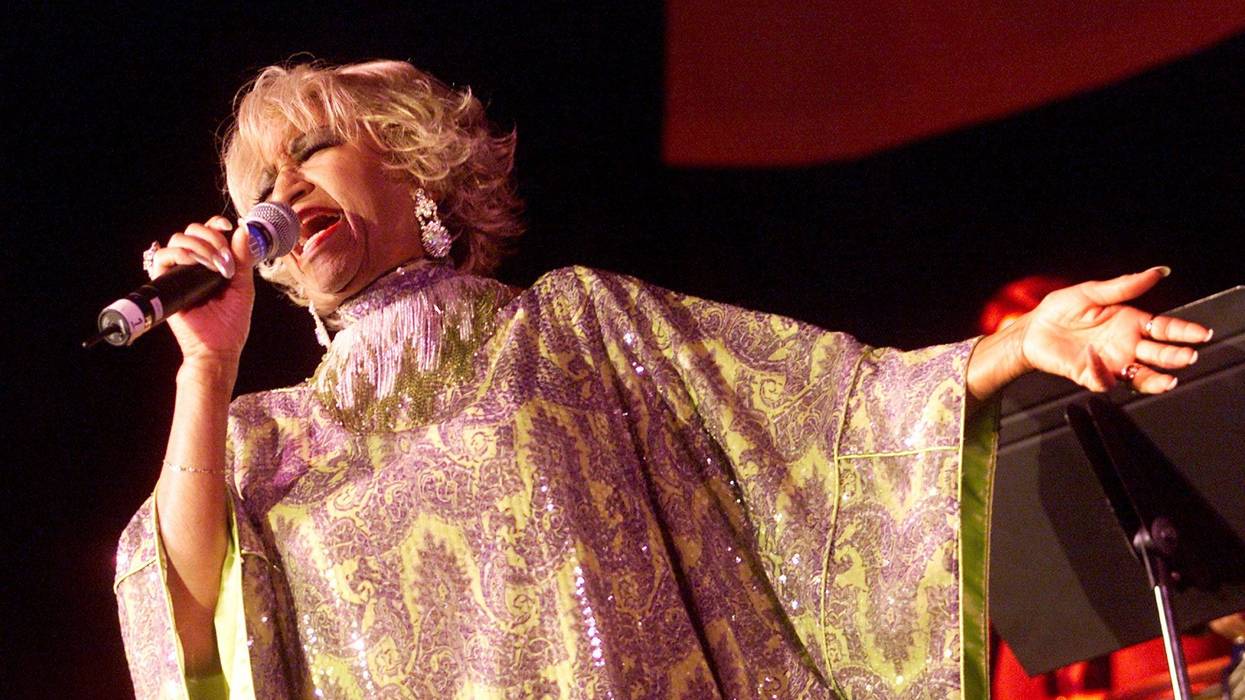 Celia Cruz singing on stage