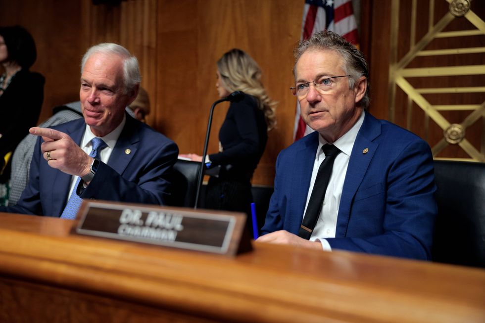 Chairman of the Senate Homeland Security and Governmental Affairs Sen. Rand Paul (R-KY) (R) and Sen. Ron Johnson (R-WI) arrive for a hearing on oversight of the Department of Homeland Security in Dirksen Senate Office Building on February 12, 2026 in Washington, DC.