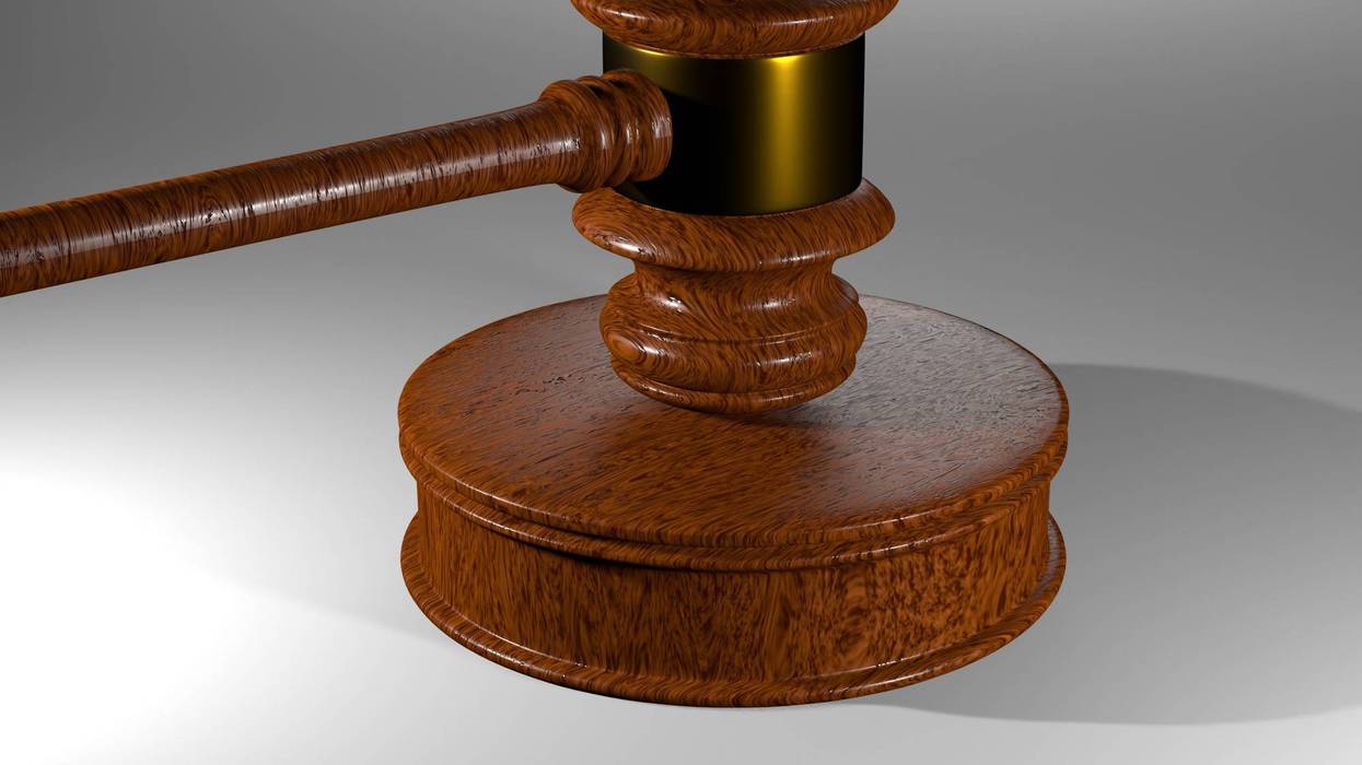 Chairman's gavel on white/gray background