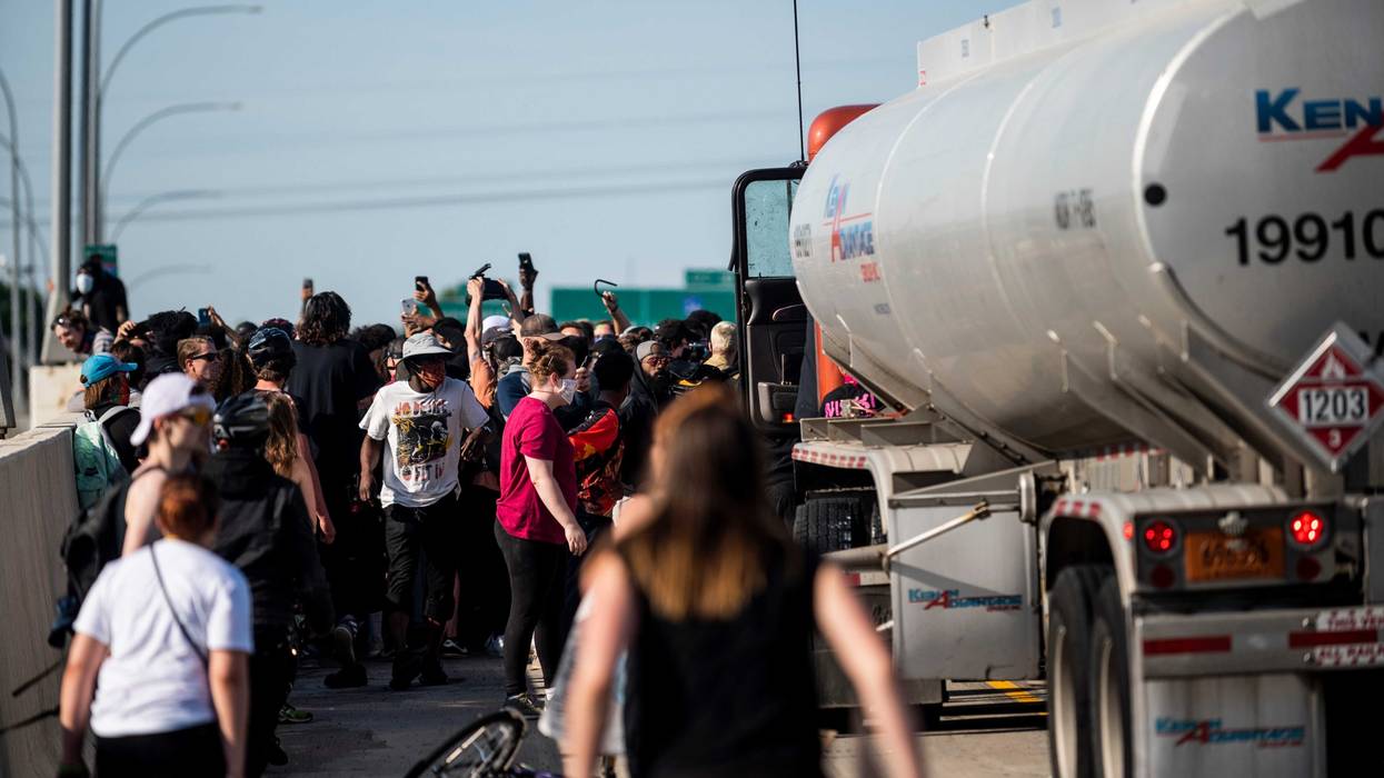 Charges to be dropped against truck driver who drove into protesters