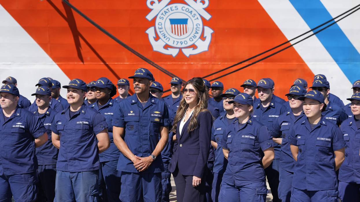 CHARLESTON, SC - NOVEMBER 07: U.S. Homeland Security Secretary Kristi Noem (C) poses for a group photo while touring the U.S. Coast Guard Station Charleston on November 7, 2025, in Charleston, South Carolina.