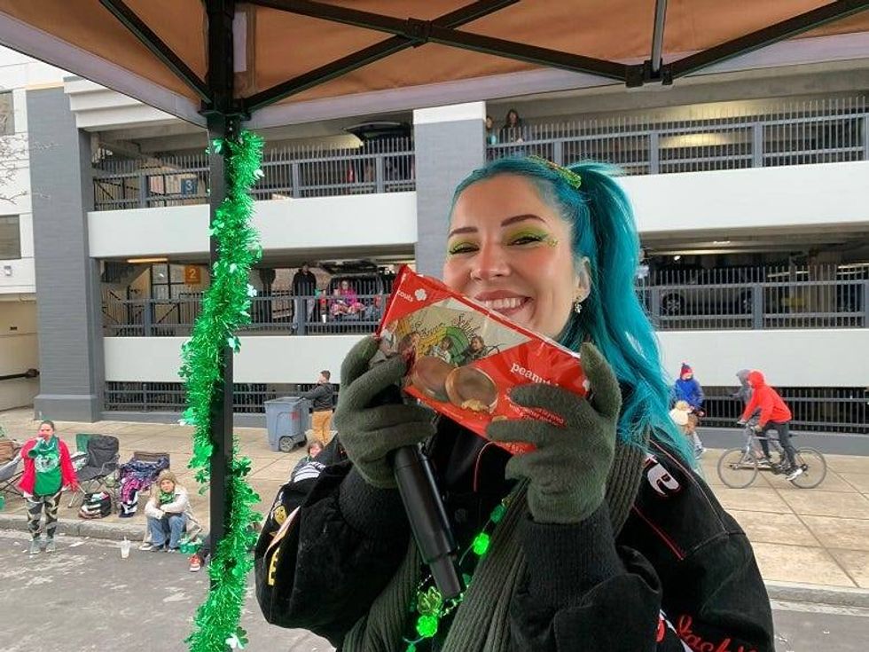 Charlotte Sands with a gift from the Girl Scouts