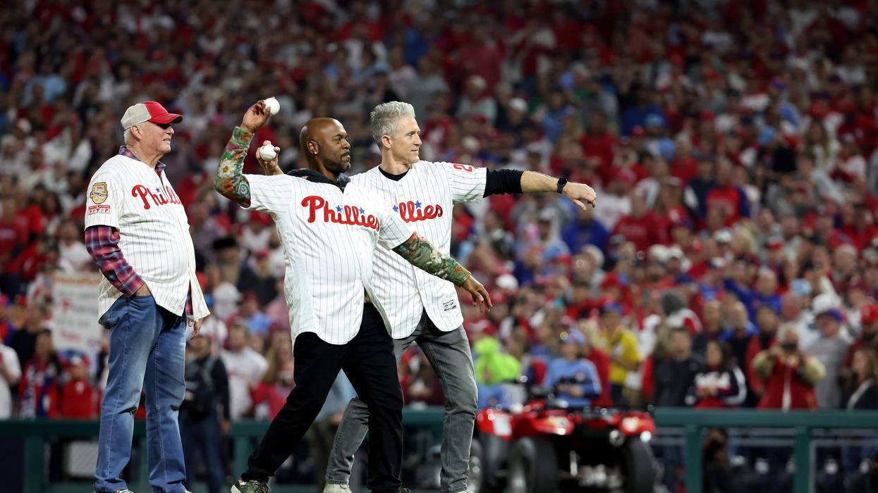 Chase Utley, Jimmy Rollins and Charlie Manuel throw out the first pitch before Game 4 of the 2022 World Series in Philadelphia.