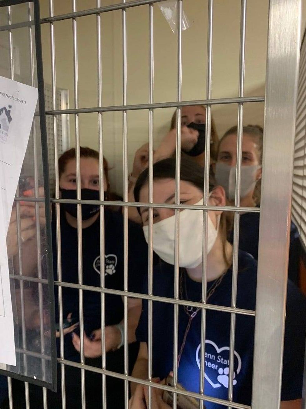 cheerleaders locked in cage