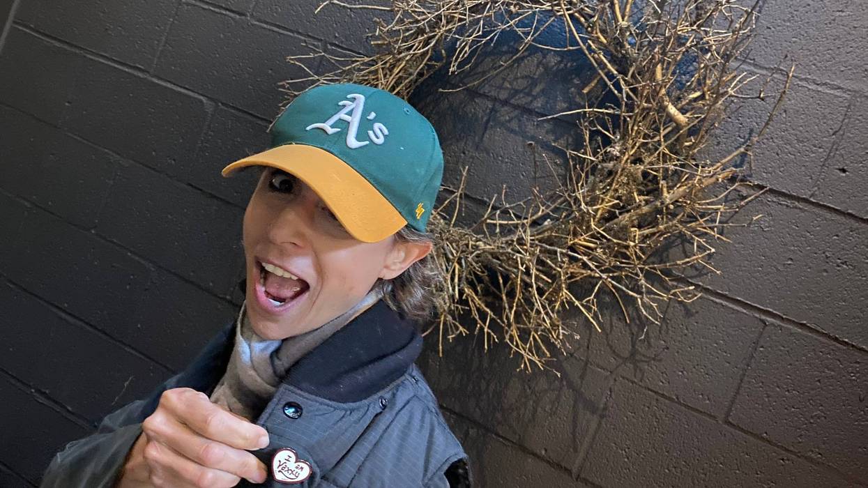 Chef Crenn sports a pin that says "I am VAXXY."