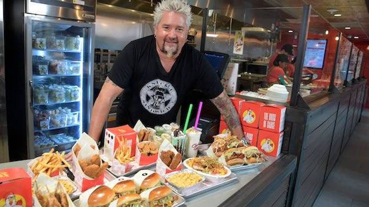 Chef Guy Fieri was at Chicken Guy! at Disney Springs Monday for a special ribbon-cutting ceremony