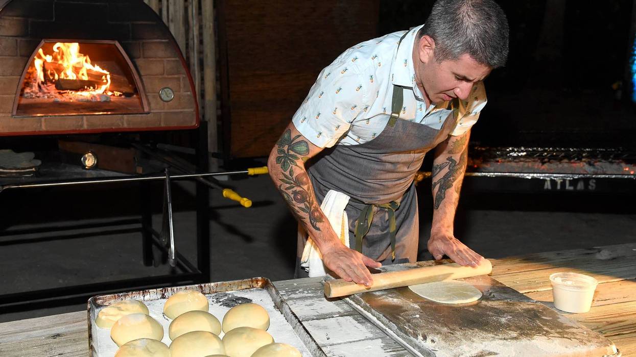 Chef Michael Solomonov rolling dough