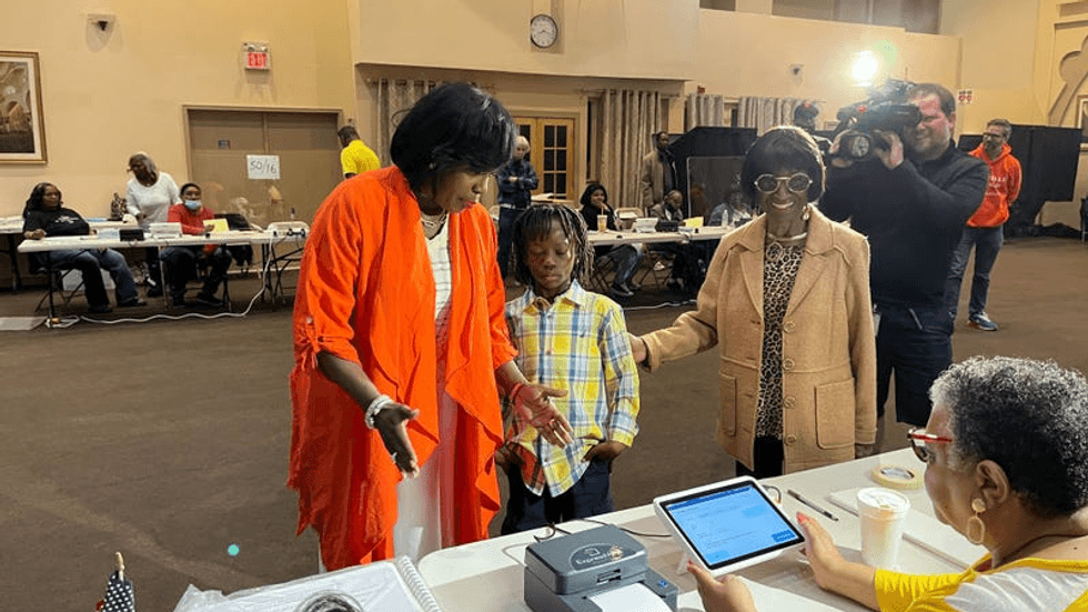 Cherelle Parker brought her son, Langston, and her mentor, former City Councilmember Marian Tasco, with her when she voted in the May 16, 2023, primary that secured her status as the a Democratic candidate for mayor