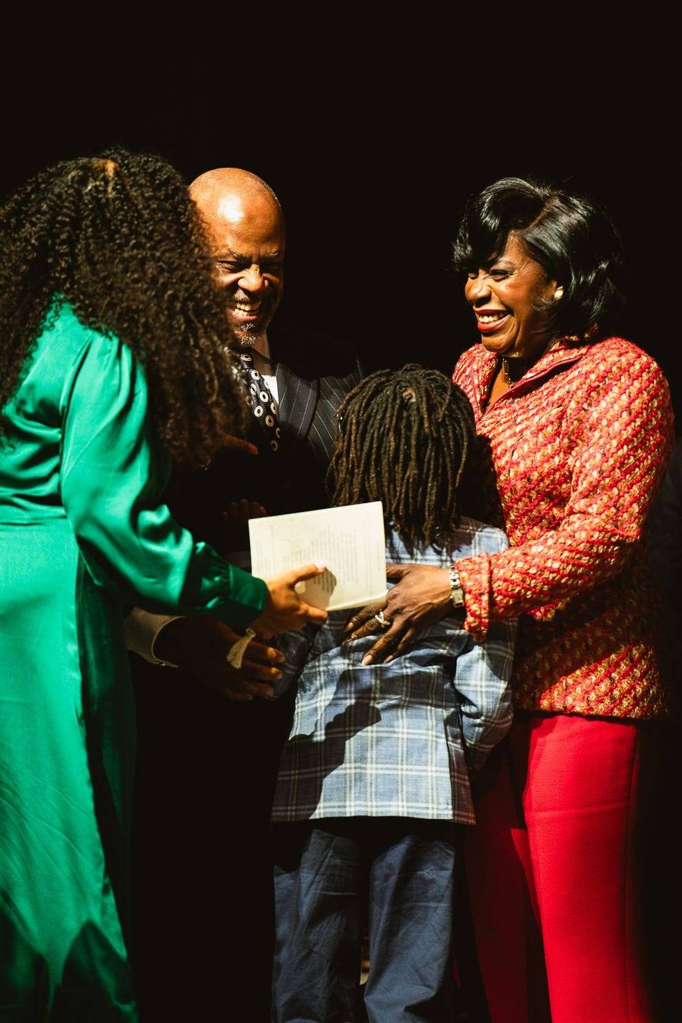 Cherelle Parker hugs her son after she is sworn in as Philadelphia
