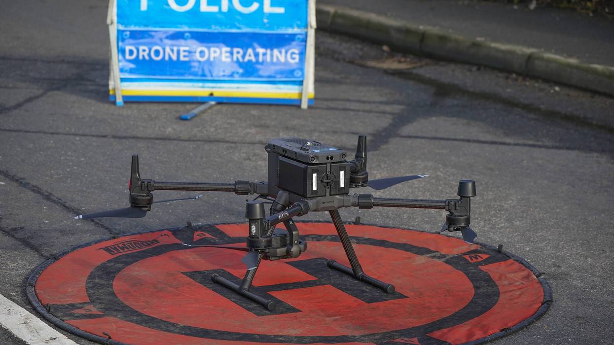 Cheshire police use their drone to survey floodwater as it begins to recede from the village of Farndon, Cheshire, in the aftermath of Storm Christoph on January 22, 2021 in Farndon, England.