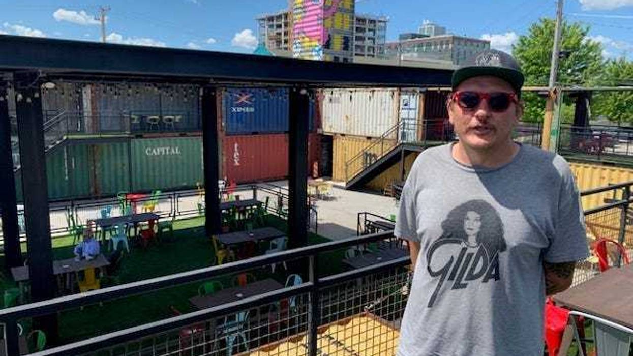 Chicago artist and muralist Mosher spent nine days a top a boom lift creating a giant, colorful mural that welcomes patrons to Recess, Fulton Market's largest outdoor patio.