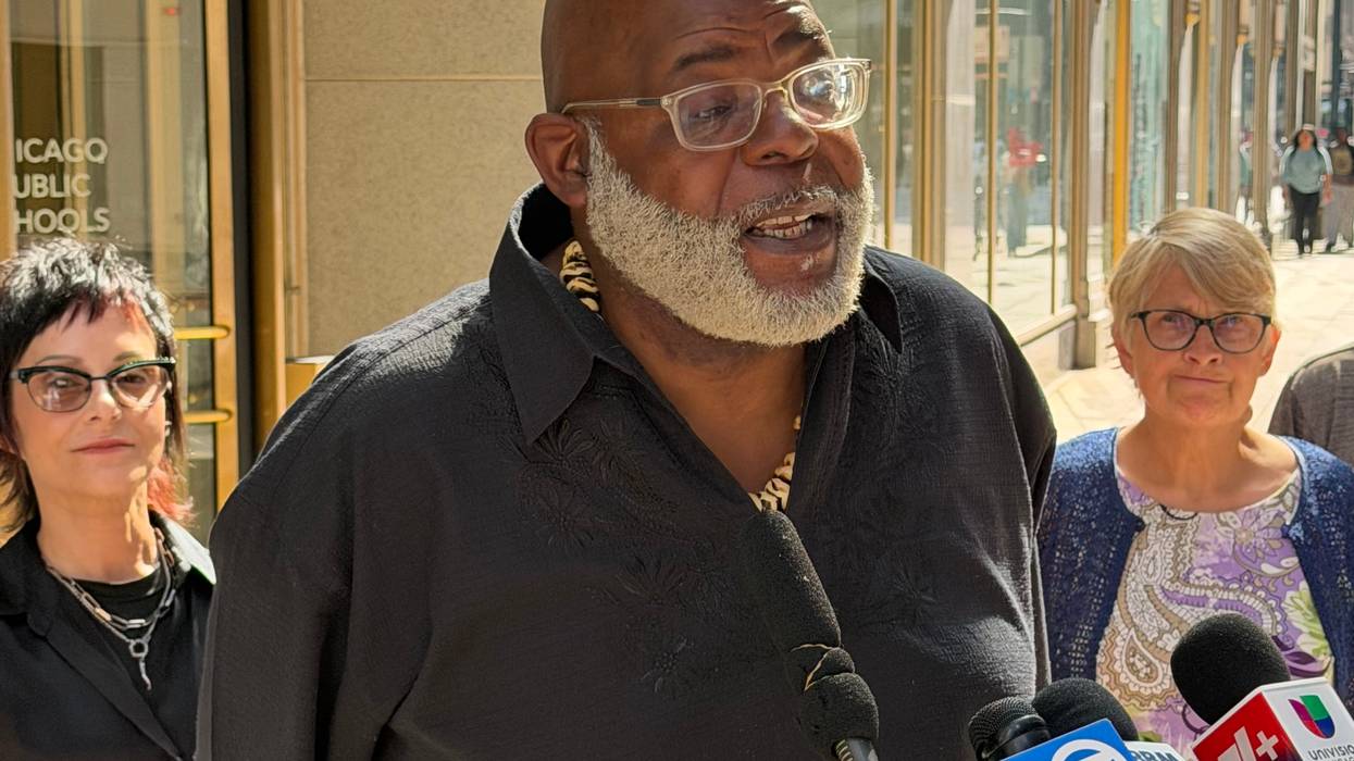 Chicago Board of Education member Jitu Brown talks to reporters outside the Chicago Public Schools Administration Building, July 8, 2026.