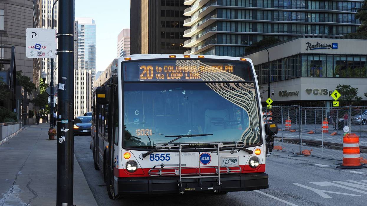Chicago CTA City Bus Driving on Downtown Street