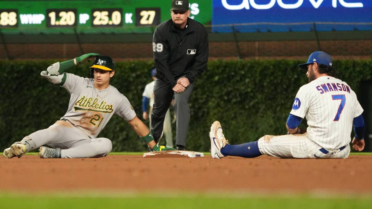 Kurtz drives in winning run in 10th as A's beat Cubs 5-4; Chicago's Happ reaches 1,000 career hits