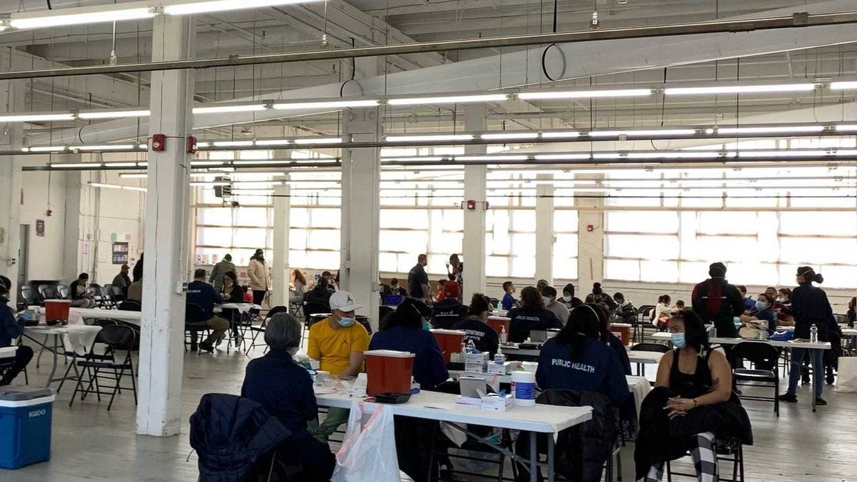 Chicago Department of Public Health workers assess residents of a migrant shelter in Pilsen for measles after multiple positive cases were identified at the site.