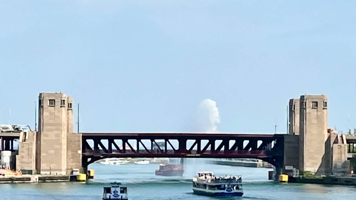 Chicago Fire Department boat sprays water on the Lake Shore Drive Bridge to cool the expanded steel so that the bridge could close after being stuck open for several hours on September 2, 2026.