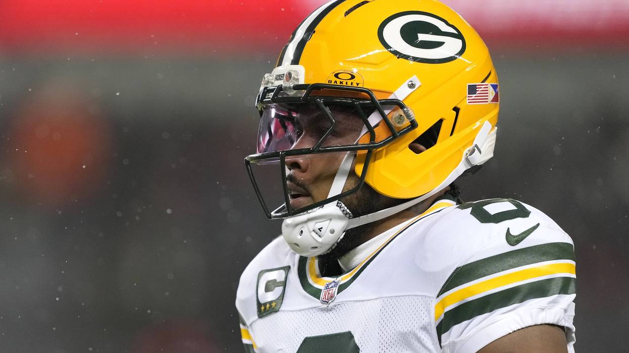 CHICAGO, ILLINOIS - JANUARY 10: Josh Jacobs #8 of the Green Bay Packers warms up before the NFC Wild Card Playoff game against the Chicago Bears at Soldier Field on January 10, 2026 in Chicago, Illinois. (Photo by Patrick McDermott/Getty Images)