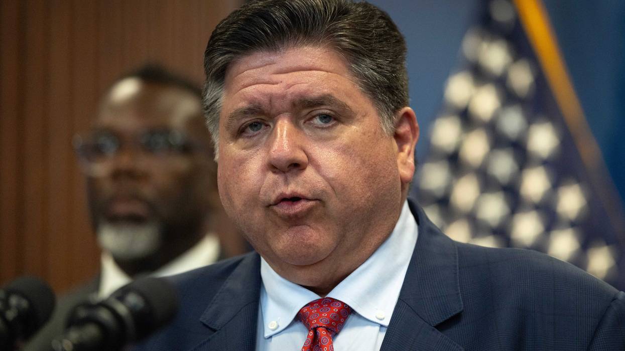 CHICAGO, ILLINOIS - SEPTEMBER 02: Illinois Governor JB Pritzker speaks to the press as Chicago Mayor Brandon Johnson listens on September 02, 2025 in Chicago, Illinois. They called the press conference to address President Donald Trump's threat to bring the National Guard and an influx of ICE agents into the city to help control crime. (Photo by Scott Olson/Getty Images)