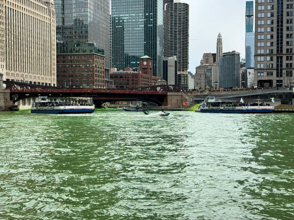 Chicago Journeymen Plumbers, Local 130, have turned the Chicago River into a bright green celebration of St. Patrick