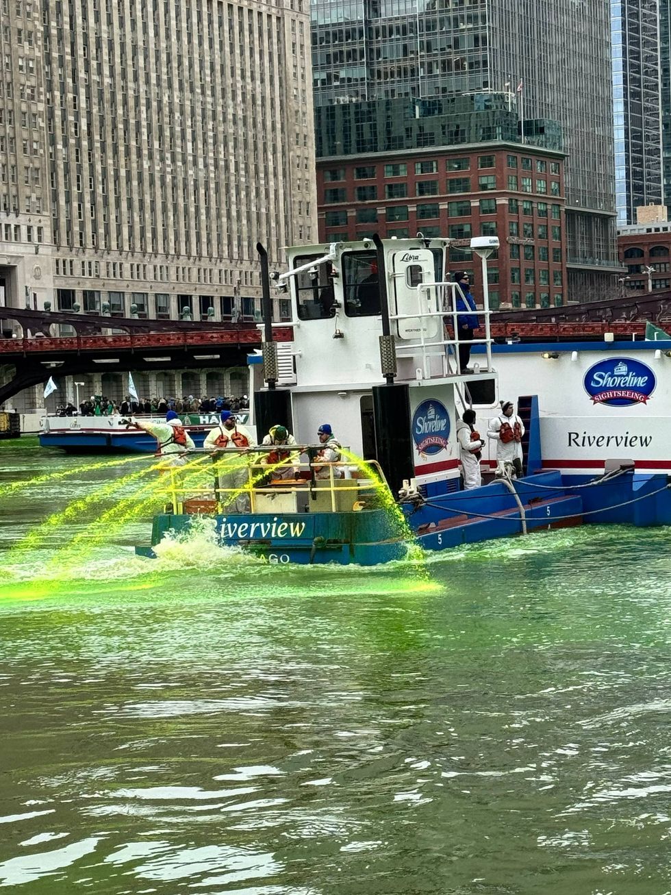 Chicago Journeymen Plumbers, Local 130, have turned the Chicago River into a bright green celebration of St. Patrick