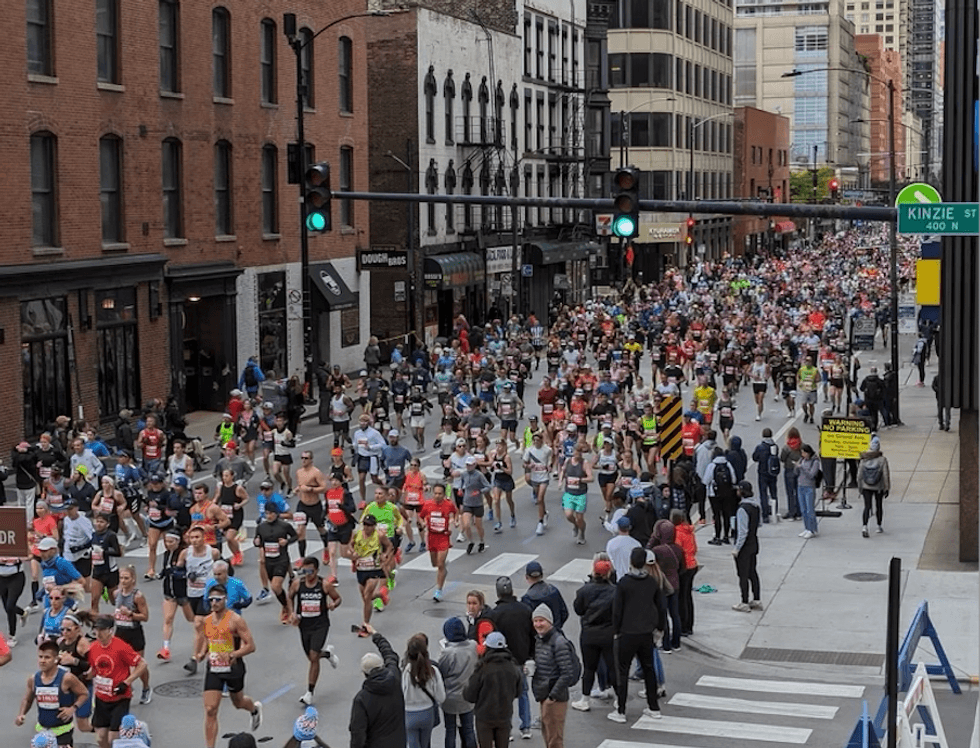 Chicago Marathon racers run through downtown Chicago.