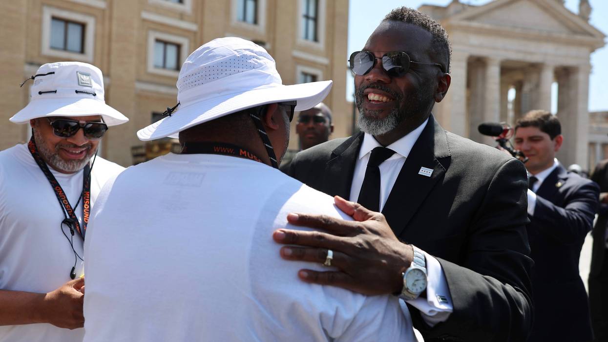 Chicago Mayor Brandon Johnson greets people in St. Peter's Square ahead of his meeting at The Vatican Thursday with Pope Leo XIV.